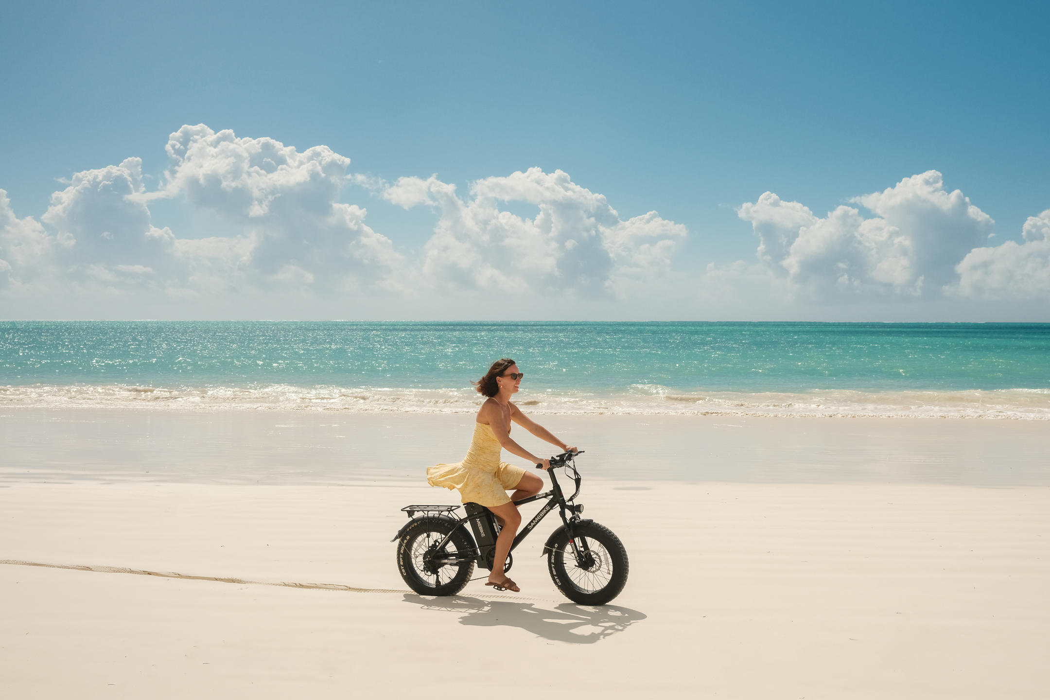 Cycling along a quiet Zanzibar beach