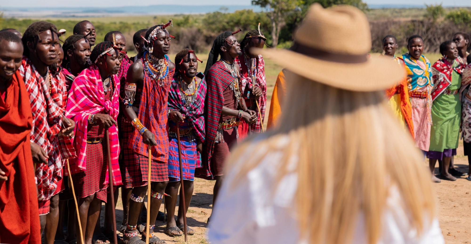 Travellers learning with a local guide during a private Kenya journey