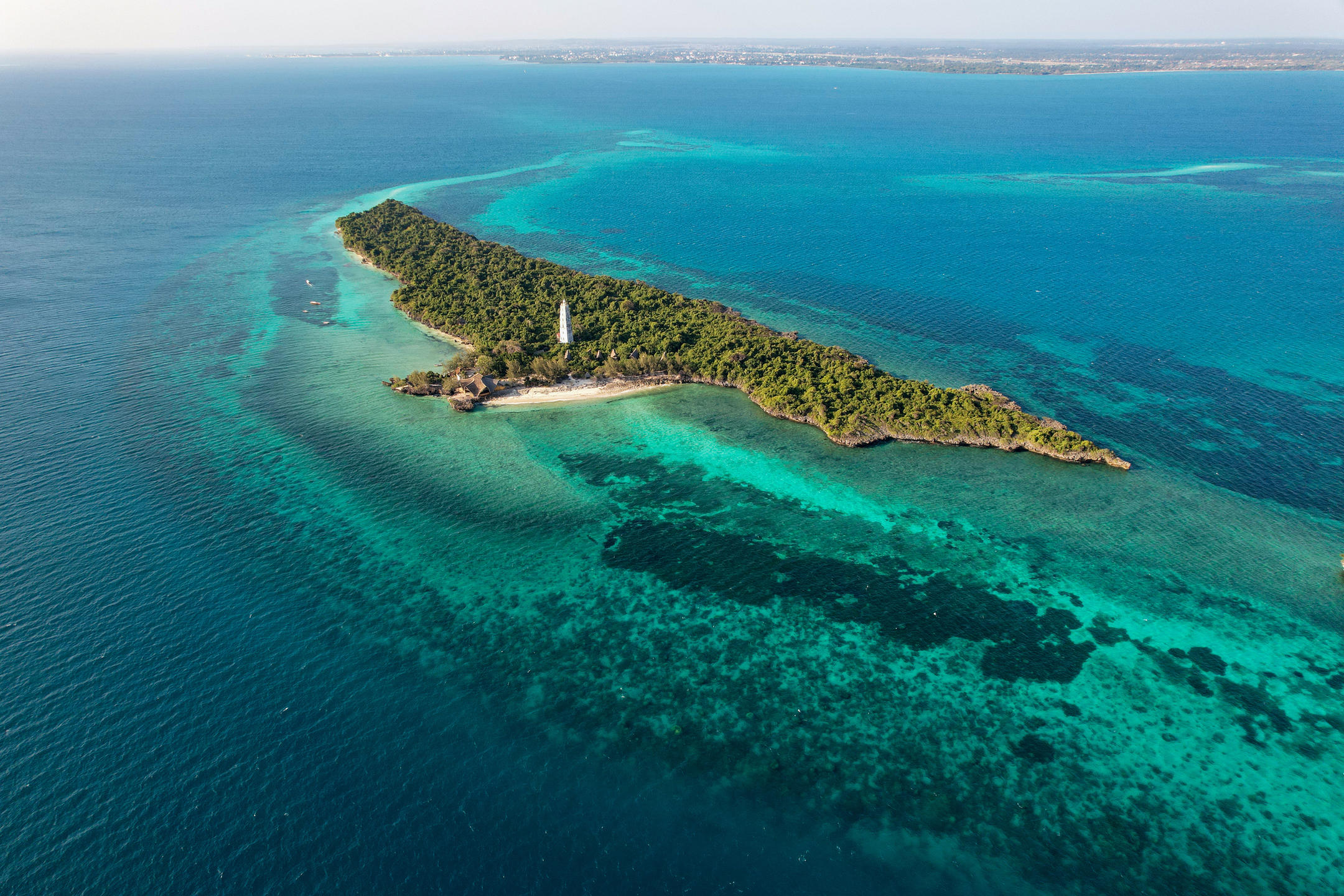 Aerial view of a tropical island shoreline