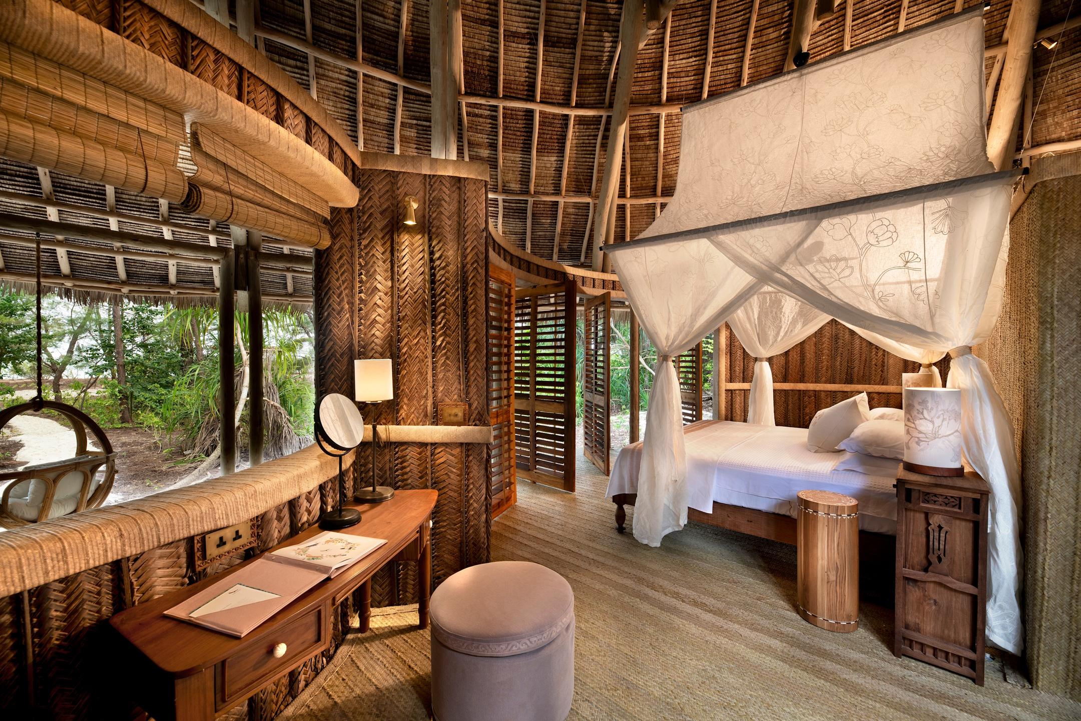 Elegant bedroom in a Zanzibar beach banda