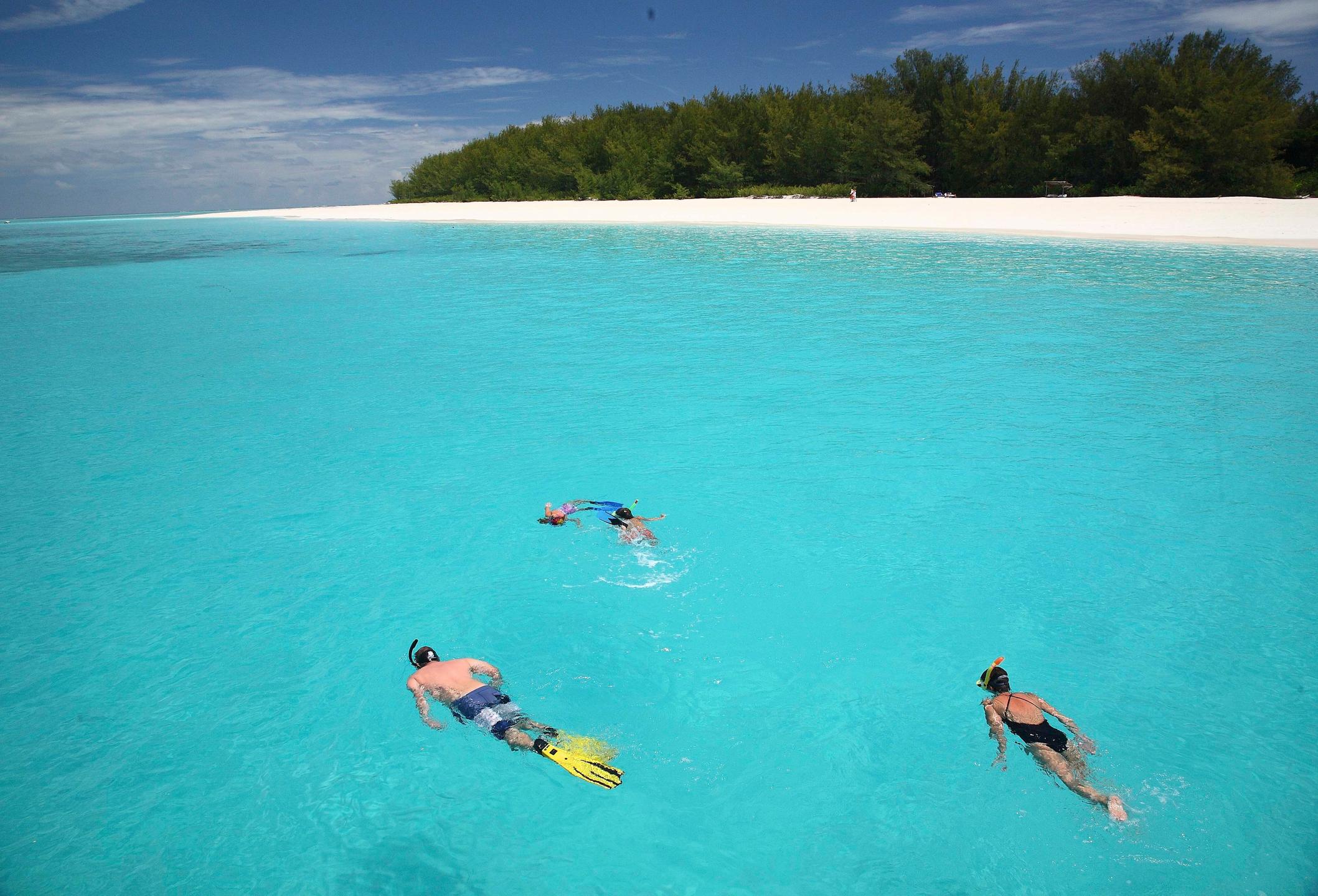 Family snorkelling in Zanzibar