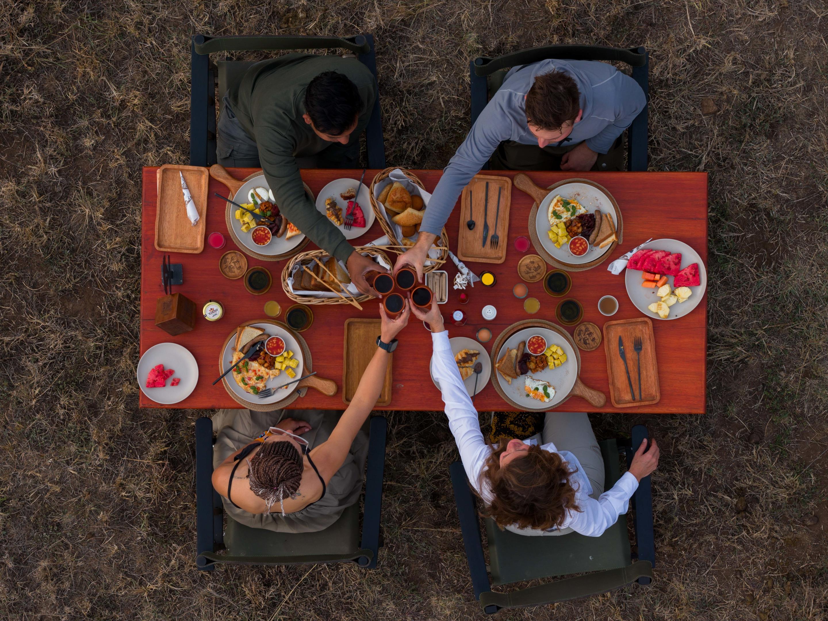 Champagne bush breakfast after balloon safari in the Serengeti
